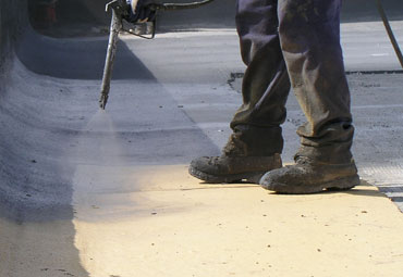Coating systems over Abilene spray foam roof systems